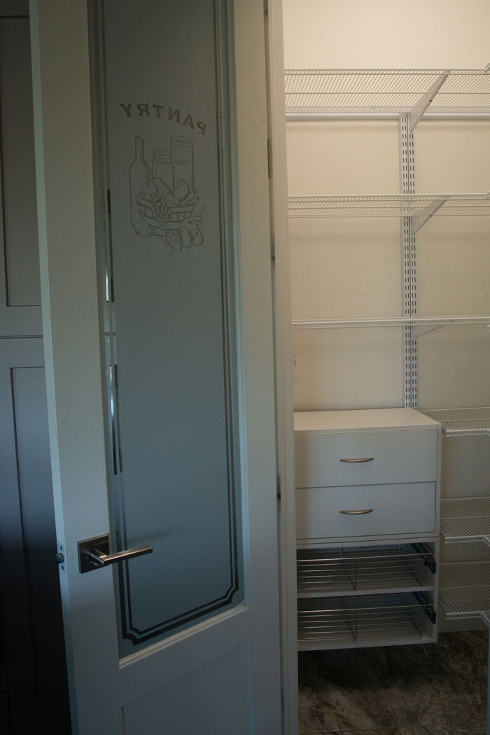 Royal Premier Homes - Eco Friendly Home Builders London - Cranbrook I - Closet with White Door