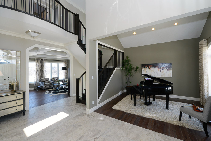 Royal Premier Homes - Eco Friendly Home Builders London - Cranbrook - Living Room with Piano and Violin