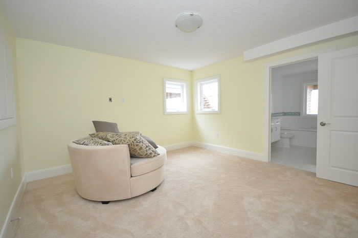 Royal Premier Homes - Eco Friendly Home Builders London - Crestwood II - Empty Room with Sofa